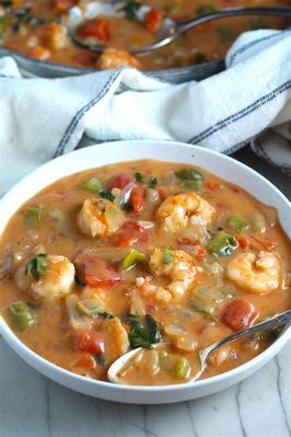  Moqueca! A Vibrant Seafood Stew That Sings with Coconut Milk and Fiery Peppers