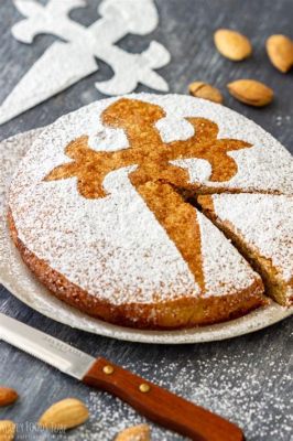  Tarta de Santiago, một chiếc bánh ngọt truyền thống của Tây Ban Nha với vị bùi bùi và hương vị mê hoặc